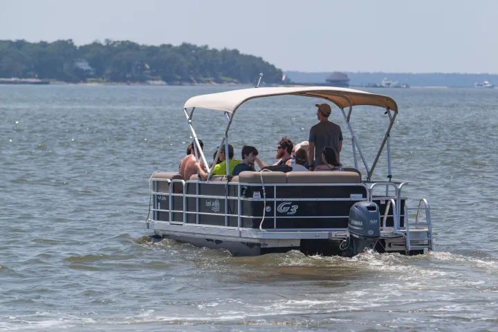 a small boat in a body of water