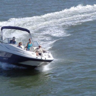 a small boat in a body of water