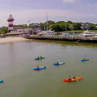 a group of people on a boat in the water