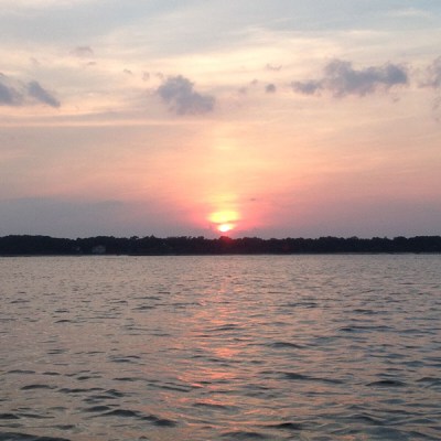 a sunset over a body of water