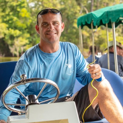 a man sitting on a boat